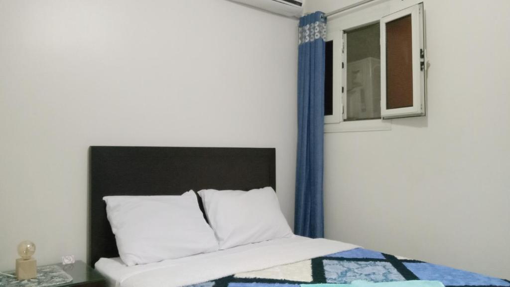 Postel nebo postele na pokoji v ubytování Giza Pyramids View Guest house