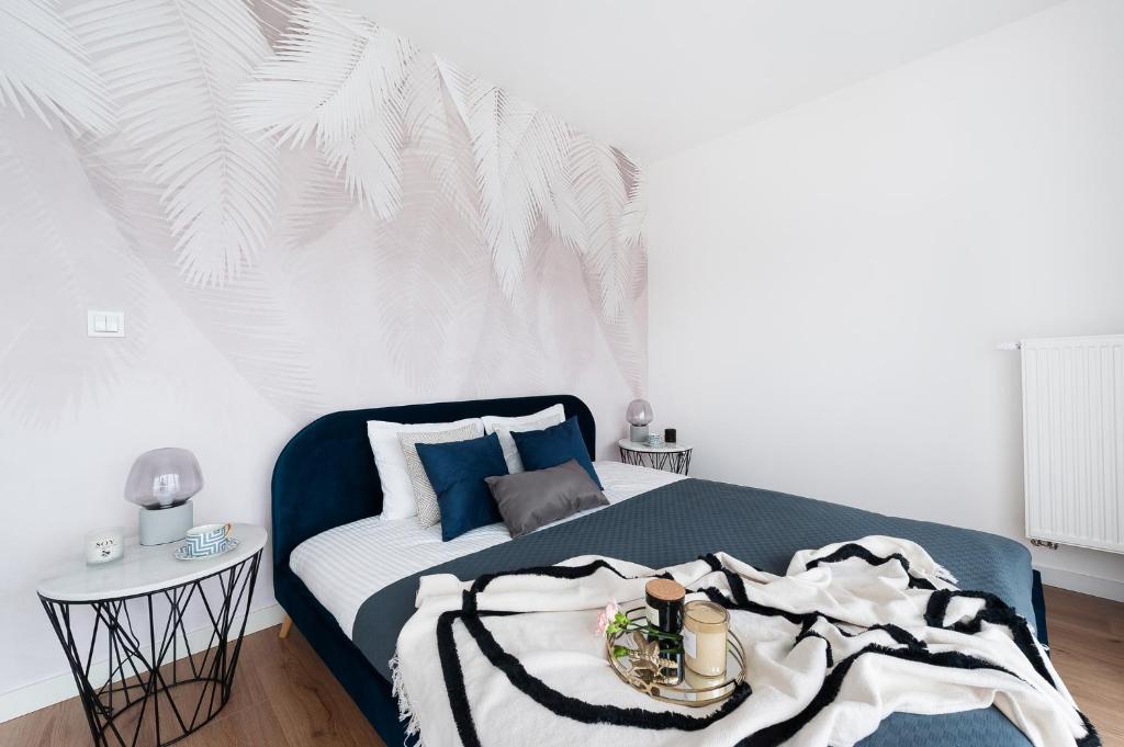 Posteľ alebo postele v izbe v ubytovaní Lake Club Apartments - LoftAffair