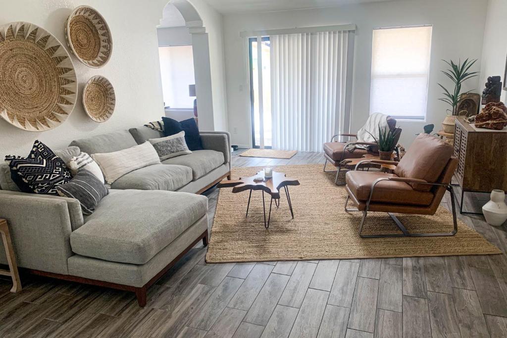 a living room with couches and chairs at Laurel Wood in Oro Valley