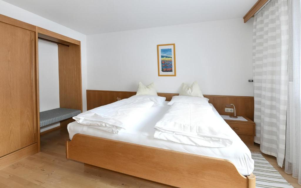 Postel nebo postele na pokoji v ubytování Gästehaus Luise