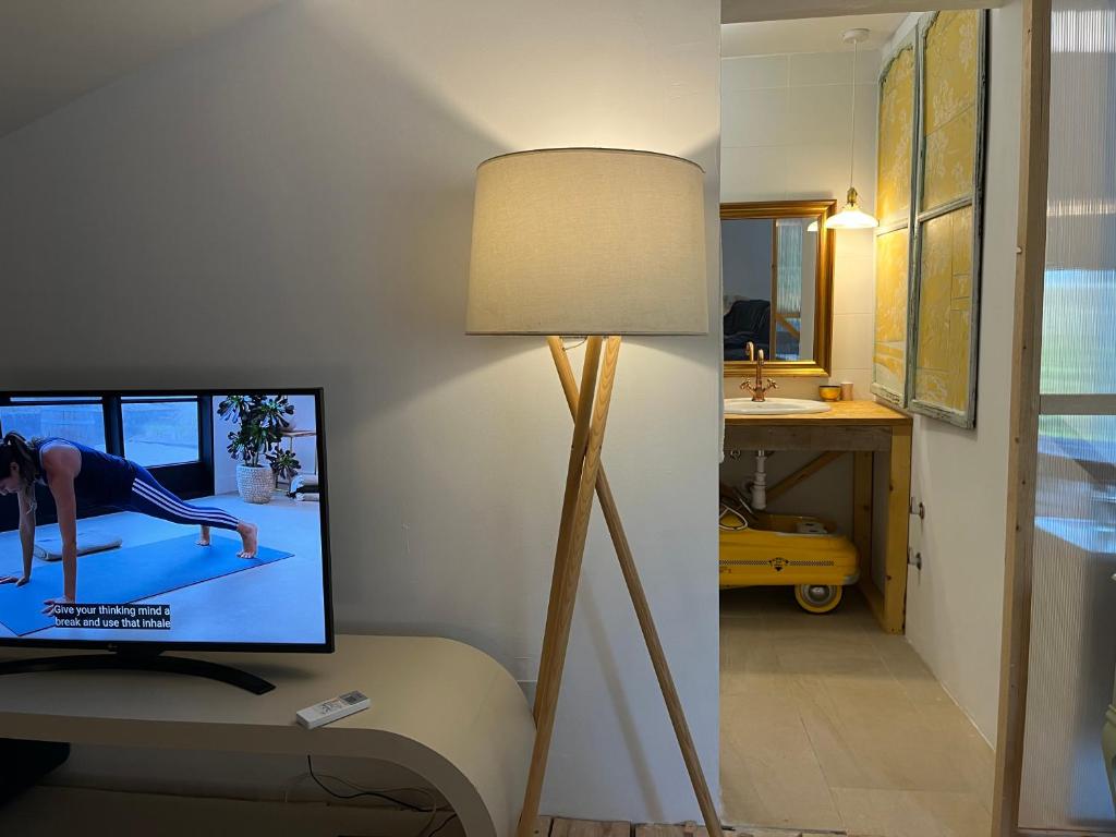 A television and/or entertainment centre at Espacio Natural