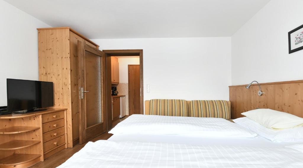 Postel nebo postele na pokoji v ubytování Gästehaus Luise