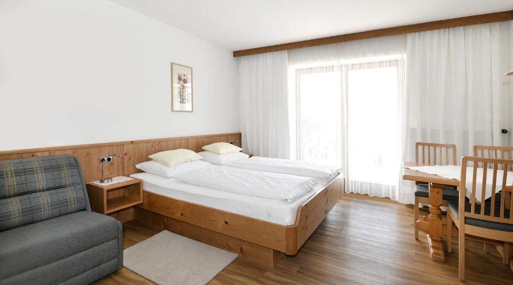 Postel nebo postele na pokoji v ubytování Gästehaus Luise