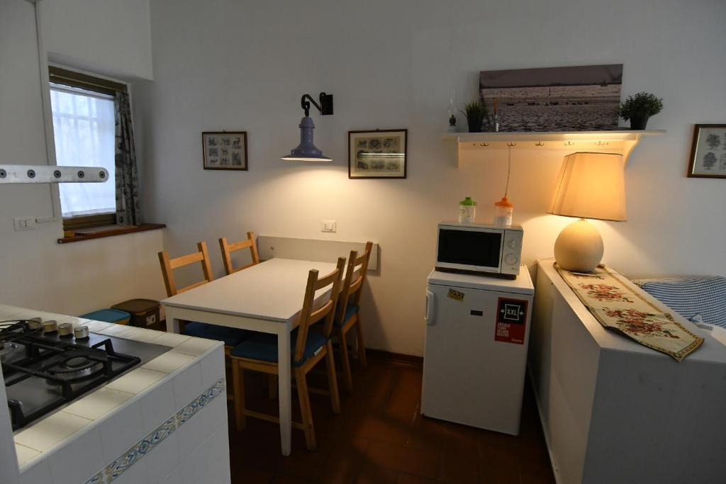 Kuchnia lub aneks kuchenny w obiekcie Alla Cantina