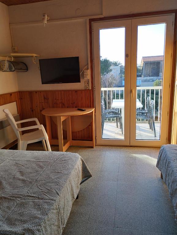 Postel nebo postele na pokoji v ubytování Le Surplage