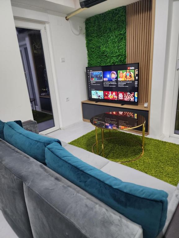 TV a/nebo společenská místnost v ubytování Daire