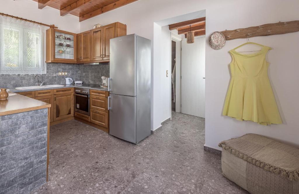 Kuchyň nebo kuchyňský kout v ubytování Sophia's Ralaki Cottage