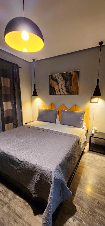 Postel nebo postele na pokoji v ubytování Hotel Voila la Moneda