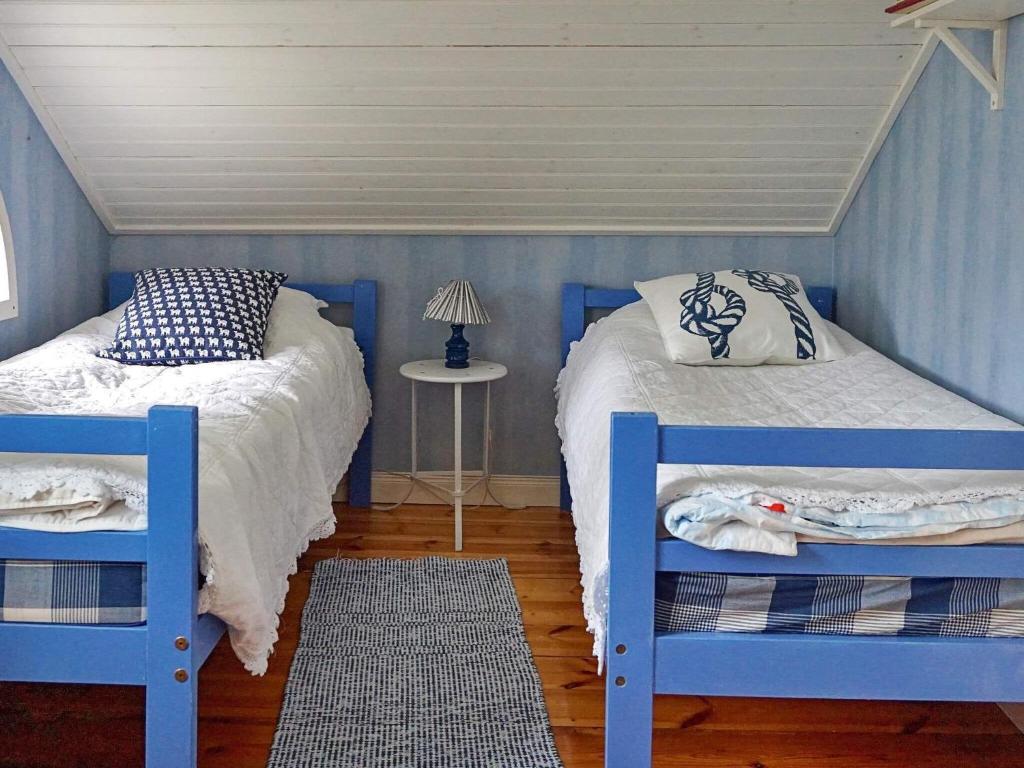 Postel nebo postele na pokoji v ubytování Holiday home GRISSLEHAMN VIII