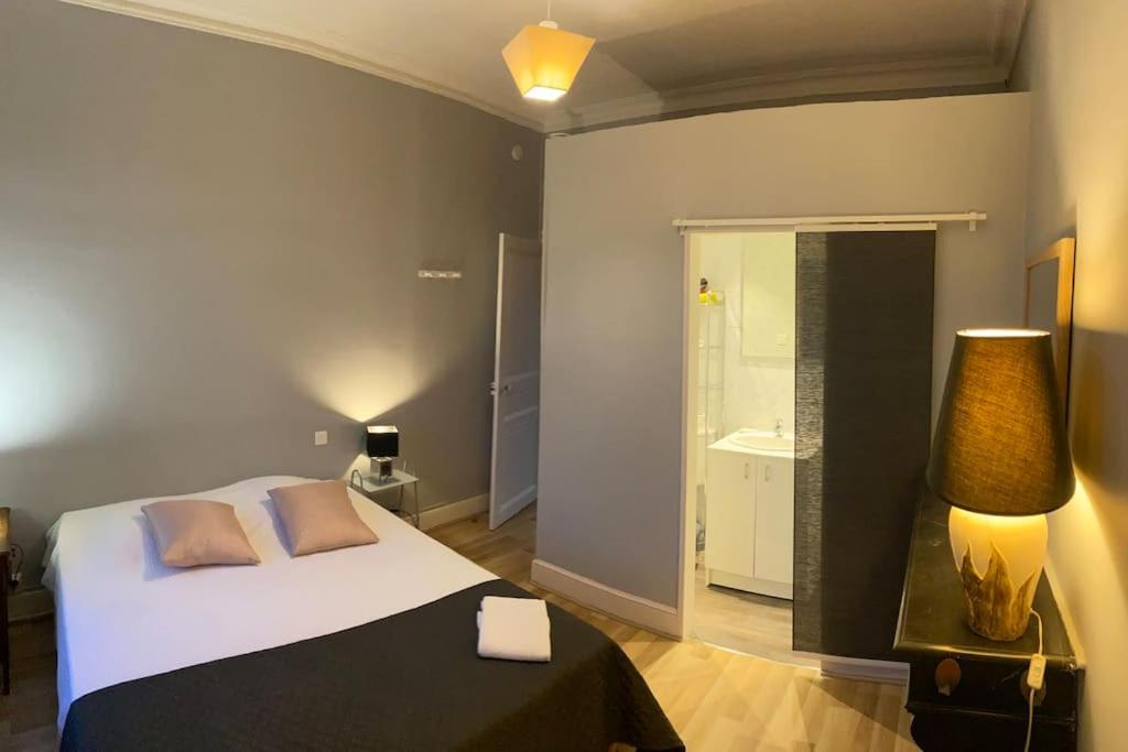 Posteľ alebo postele v izbe v ubytovaní Gîte au Balcon