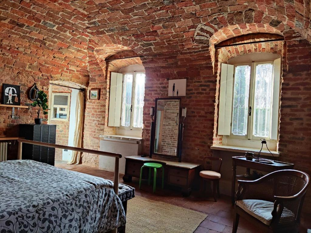 A bed or beds in a room at Corte dell'Uva