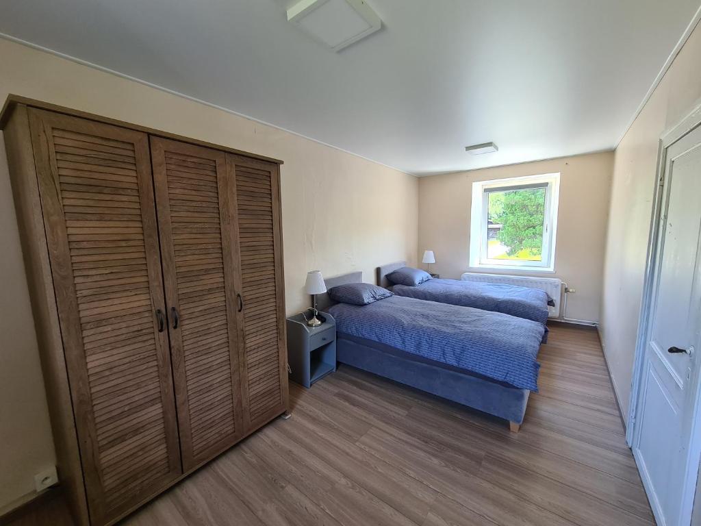 Postel nebo postele na pokoji v ubytování le Lombry