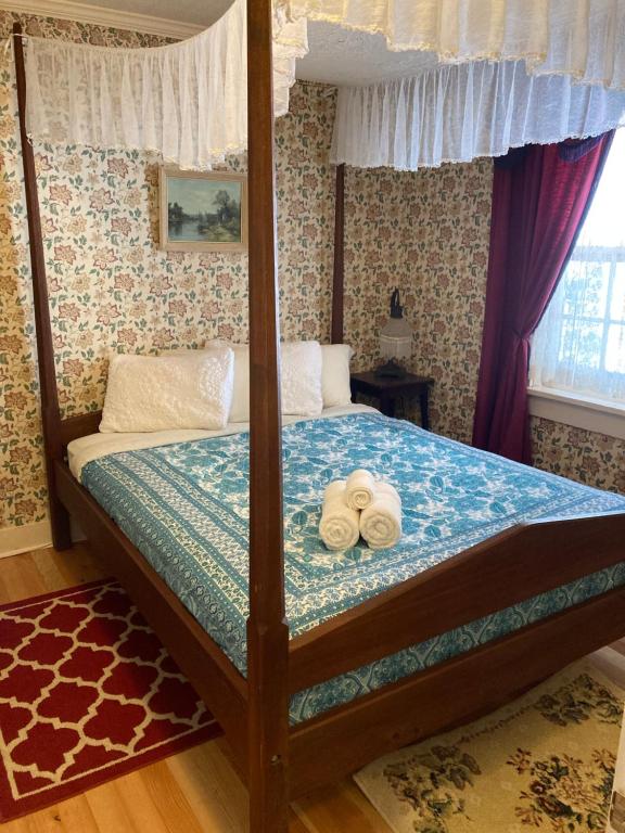 Postel nebo postele na pokoji v ubytování St. George Hotel