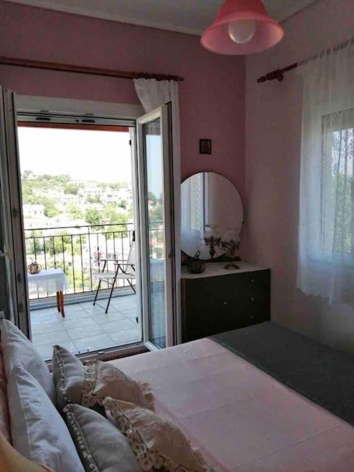 Postel nebo postele na pokoji v ubytování Σπίτι με απεριόριστη θέα