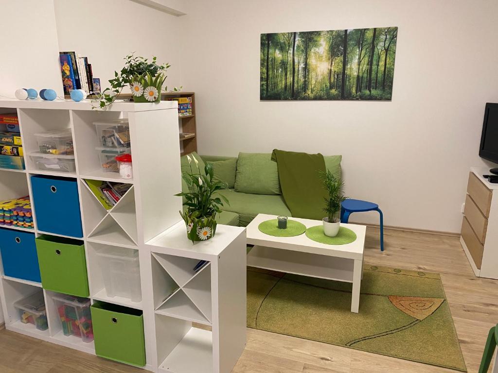 TV a/nebo společenská místnost v ubytování Apartmán Meluzína