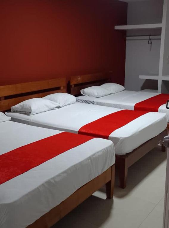 Postel nebo postele na pokoji v ubytování Hotel MCH