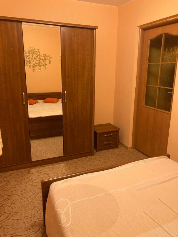 Postel nebo postele na pokoji v ubytování Apartament 2 pokoje Czarny Potok Krynica Zdrój