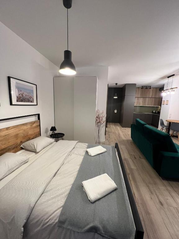 Posteľ alebo postele v izbe v ubytovaní Apartament WARSZAWA Kolejowa HUB EXPO