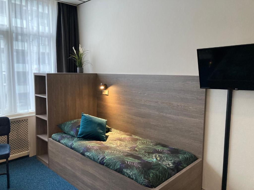 TV a/nebo společenská místnost v ubytování Hotel Poseidon