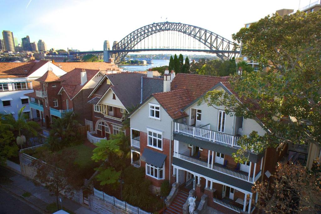 arial view of houses in a city with a bridge at Glenferrie Lodge in Sydney