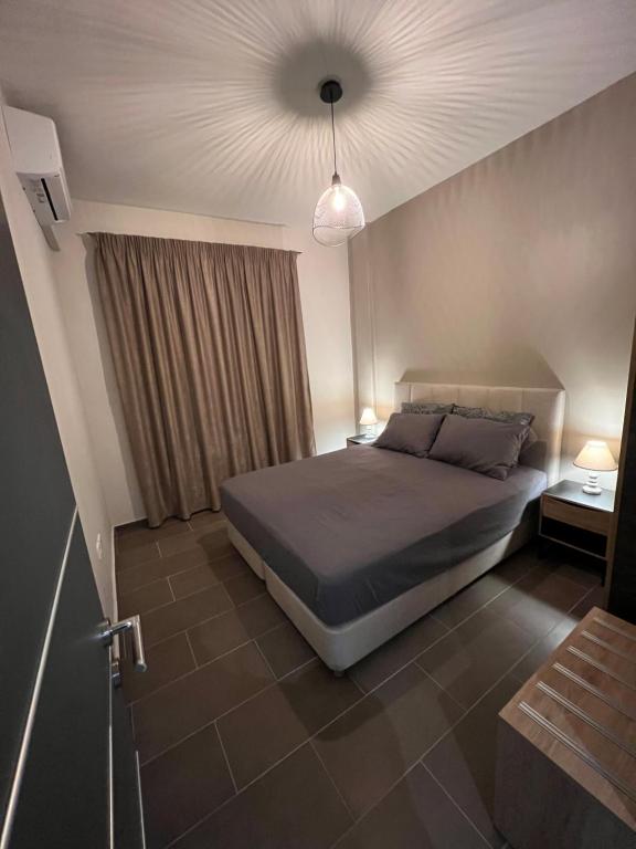 Posteľ alebo postele v izbe v ubytovaní Supreme City Heart Suites