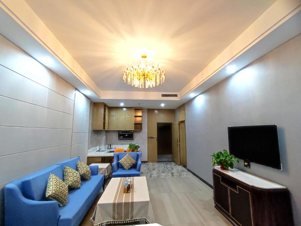 TV a/nebo společenská místnost v ubytování Zhangye KAI RUI Hotel