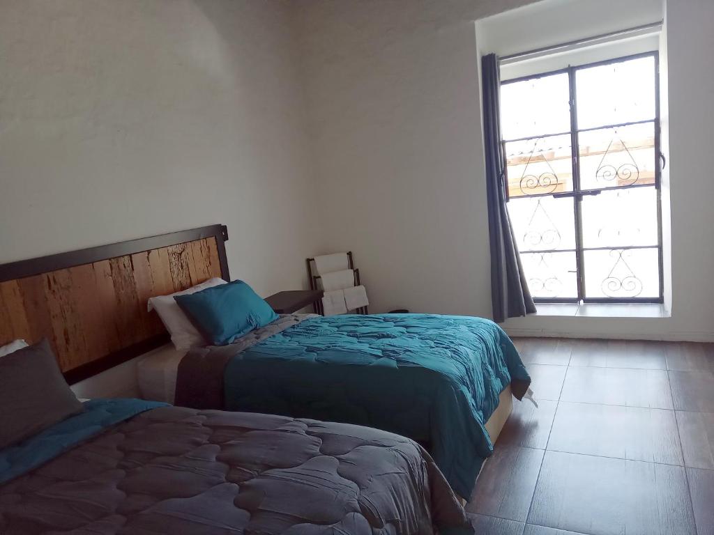 Postel nebo postele na pokoji v ubytování El Salto de Camela - Vera y Espín Hostal