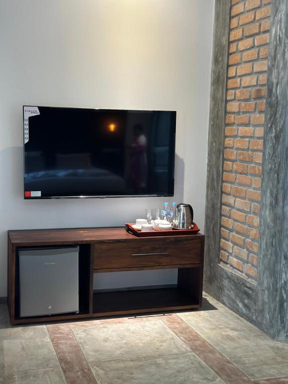TV a/nebo společenská místnost v ubytování Ami Mirissa