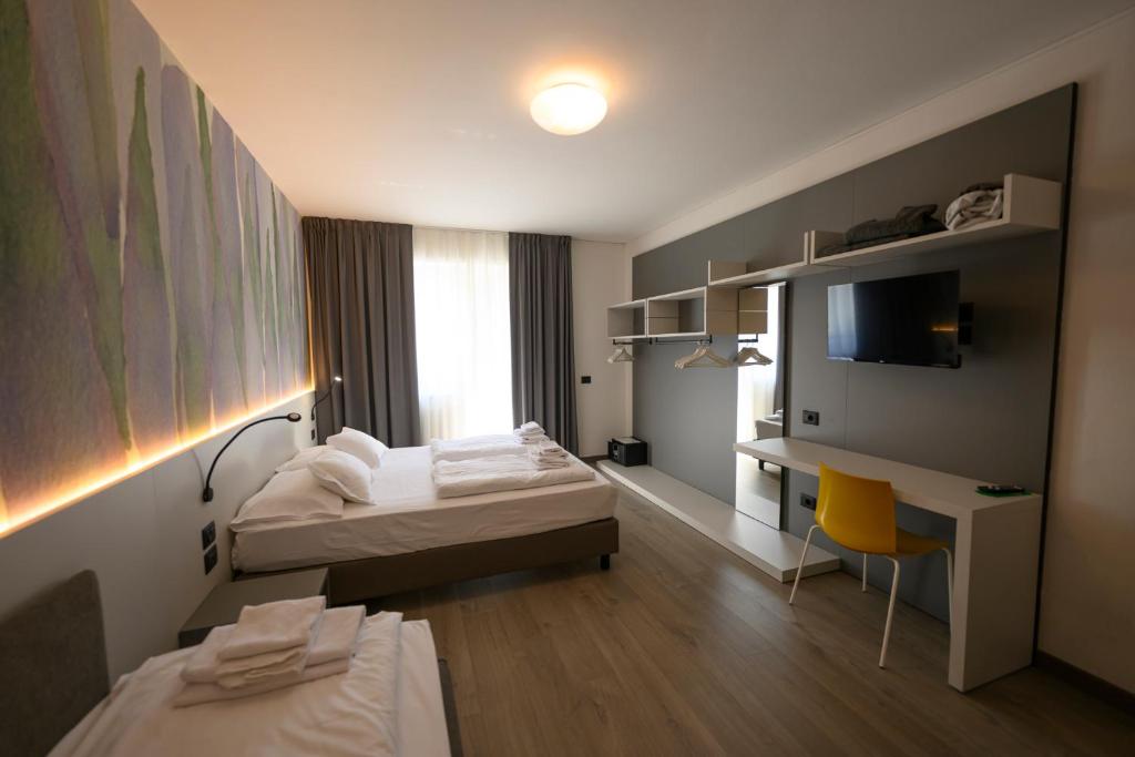 Postel nebo postele na pokoji v ubytování Park Hotel Eden