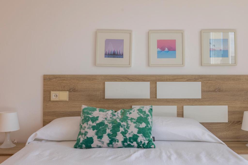 Postel nebo postele na pokoji v ubytování Apartagal-Edificio Celtas Foz