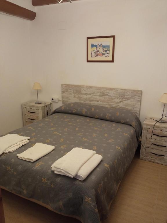 Postel nebo postele na pokoji v ubytování Cal Tort