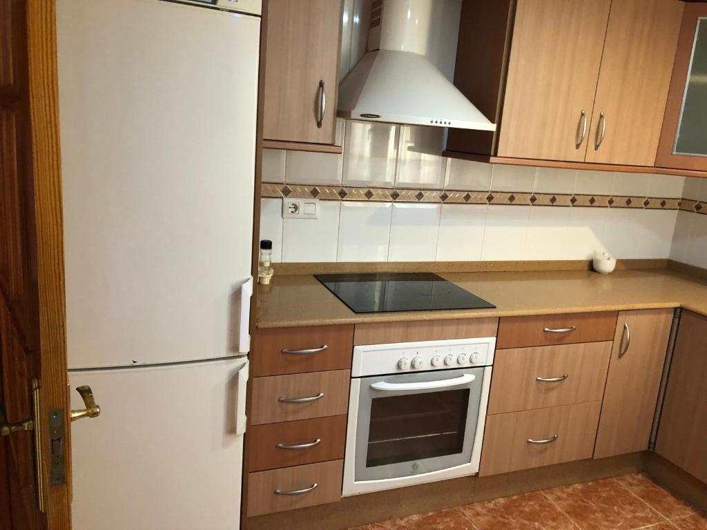 A kitchen or kitchenette at CARLA 24