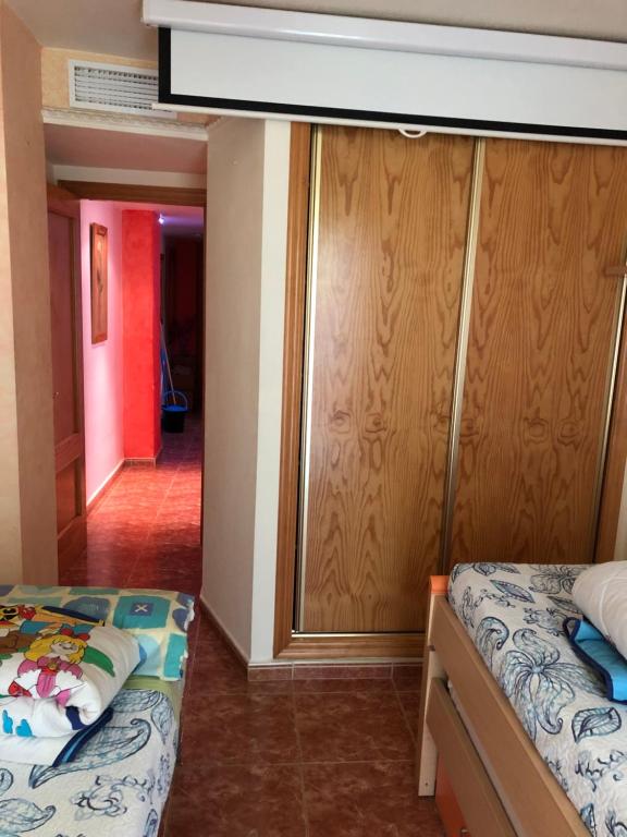 A bed or beds in a room at CARLA 24