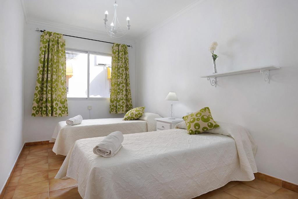 Posteľ alebo postele v izbe v ubytovaní Casa Pedro Conil