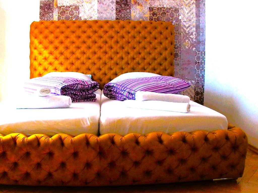 Posteľ alebo postele v izbe v ubytovaní Ambassador Apartament