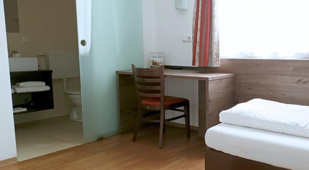 Postel nebo postele na pokoji v ubytování Wallseerhof