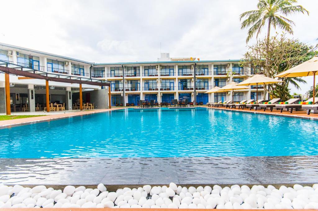 Bazén v ubytování Camelot Beach Hotel nebo v jeho okolí