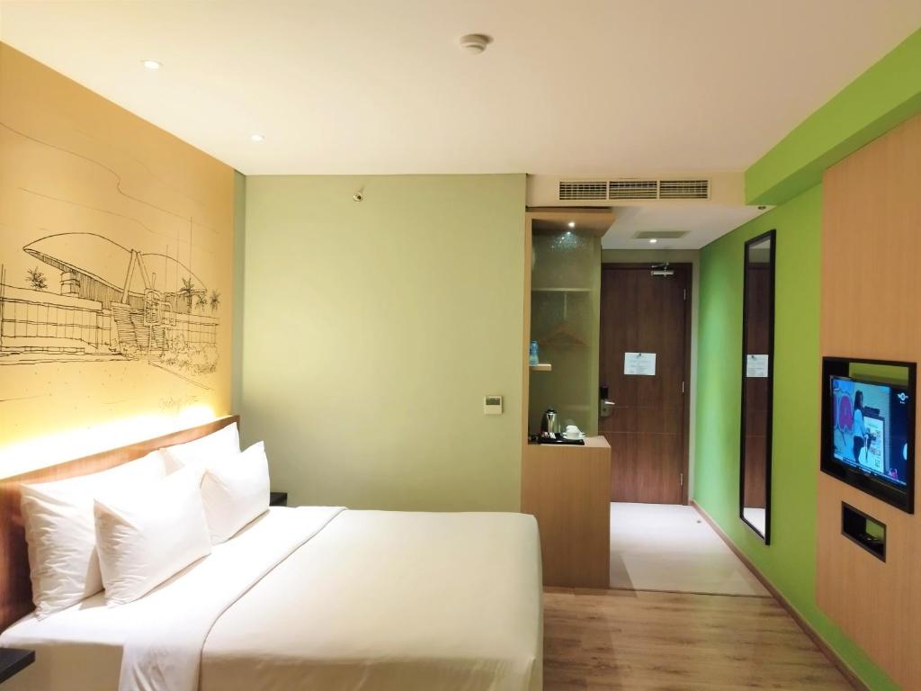 TV a/nebo společenská místnost v ubytování AONE Hotel