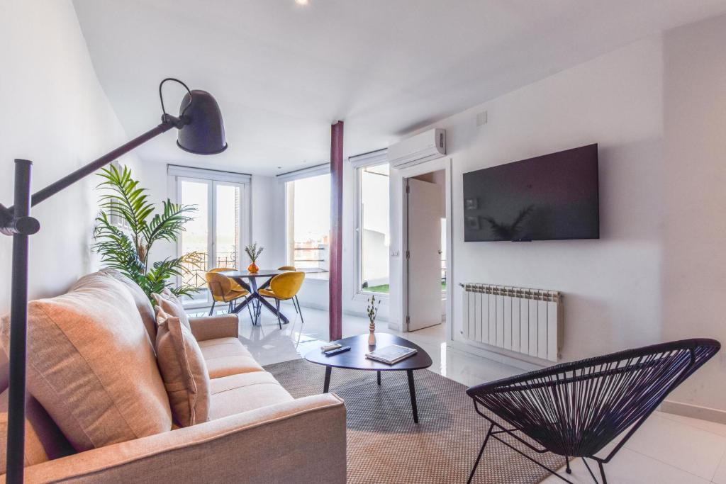 TV a/nebo společenská místnost v ubytování Apartamento Embajadores IX