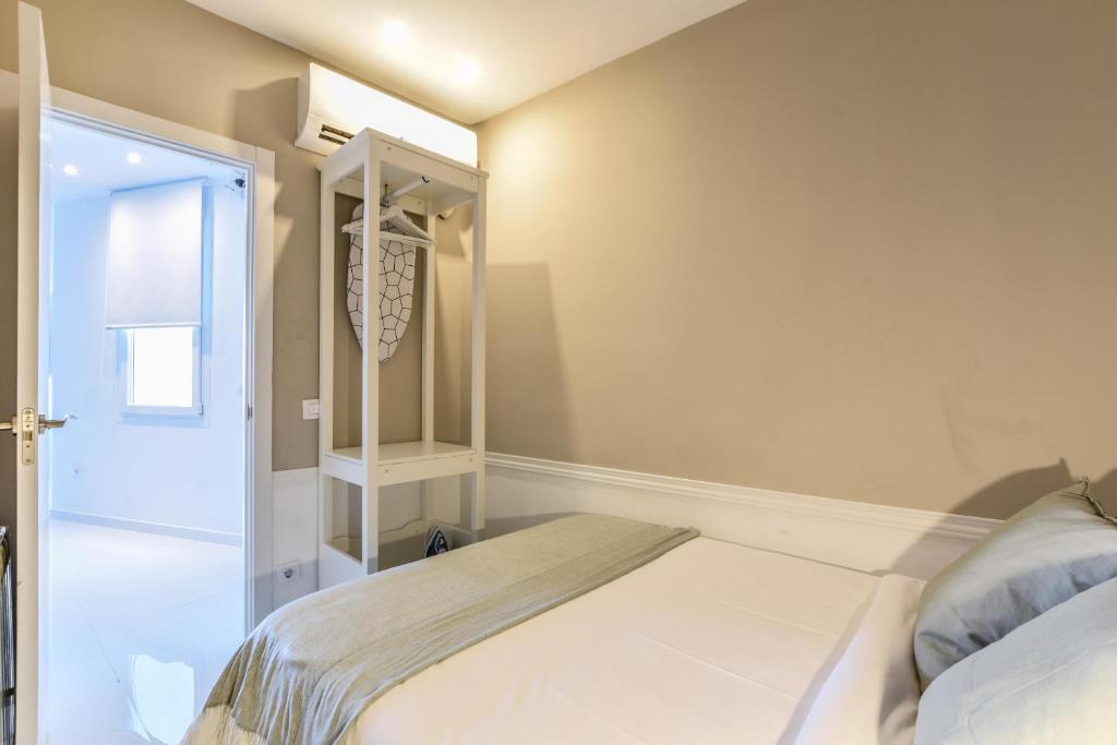 Postel nebo postele na pokoji v ubytování Apartamento Embajadores IX