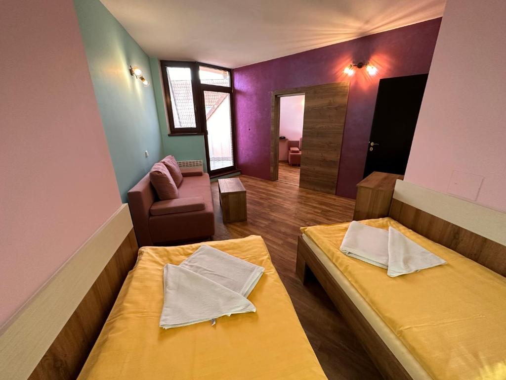 Postel nebo postele na pokoji v ubytování Hotel N