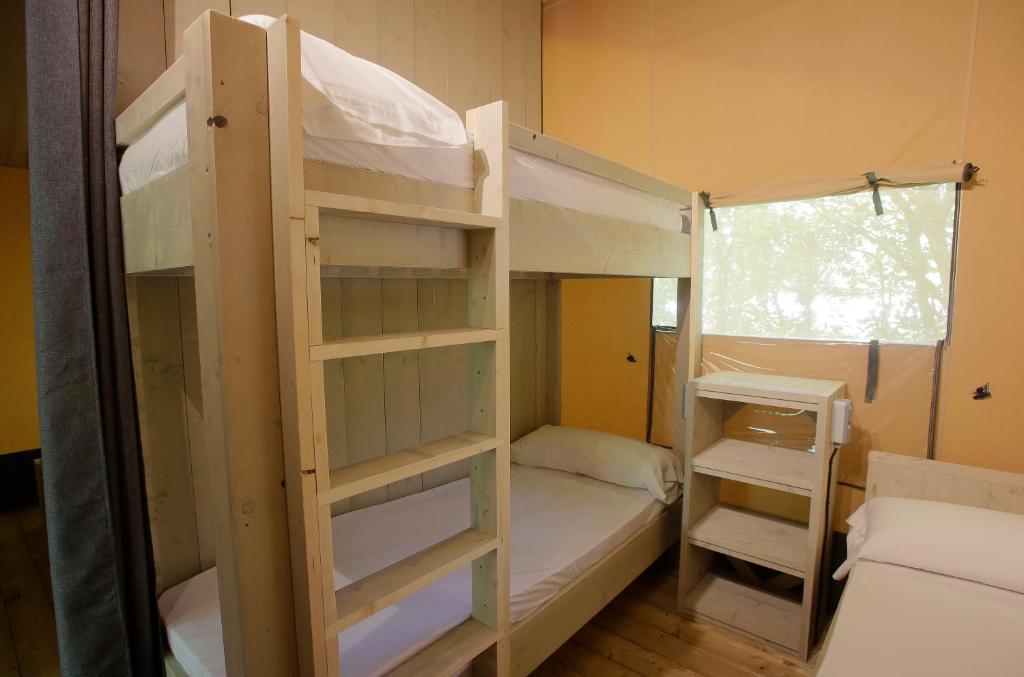 Postel nebo postele na pokoji v ubytování CAMPING ETXARRI