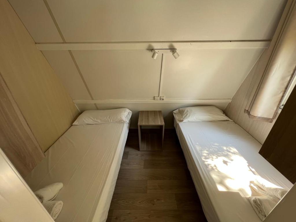 Postel nebo postele na pokoji v ubytování CAMPING ETXARRI
