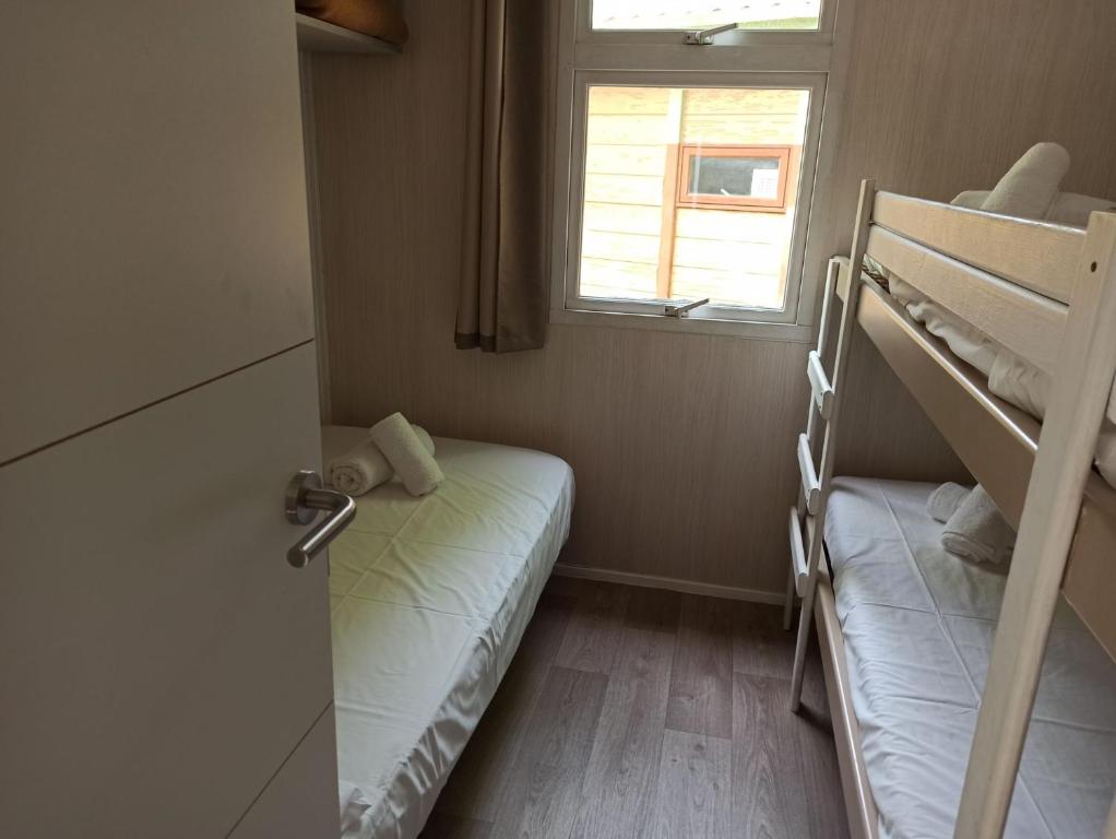 Postel nebo postele na pokoji v ubytování CAMPING ETXARRI
