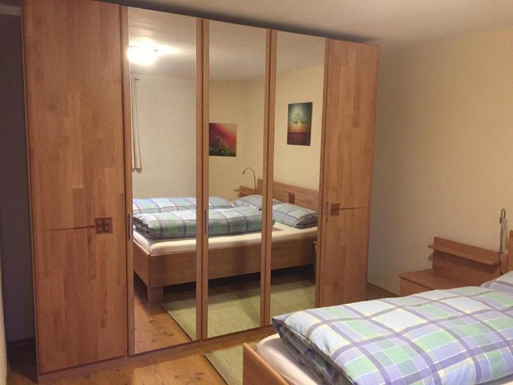 Postel nebo postele na pokoji v ubytování FW Rettenberger