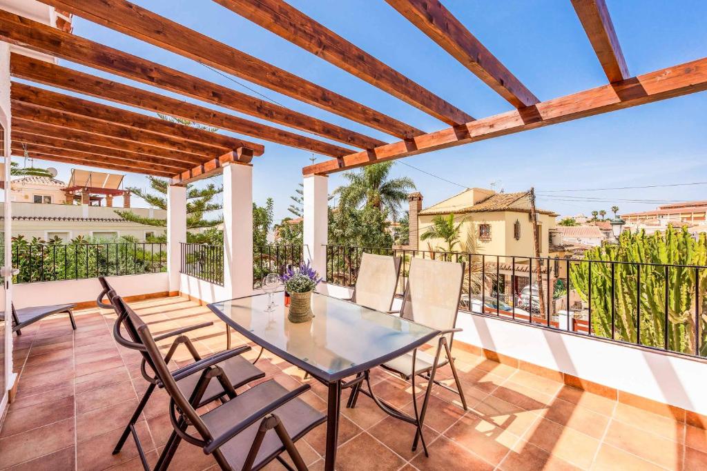 A balcony or terrace at Villa El Algarrobo
