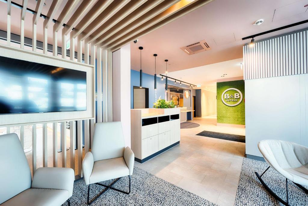 TV a/nebo společenská místnost v ubytování B&B Hotel Willingen