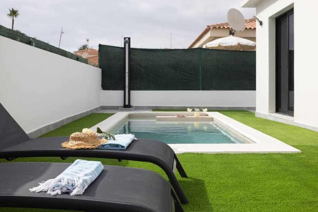 Bazén v ubytování Sunnyland Villa Sueño Azul nebo v jeho okolí