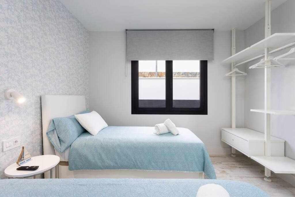 Postel nebo postele na pokoji v ubytování Sunnyland Villa Sueño Azul