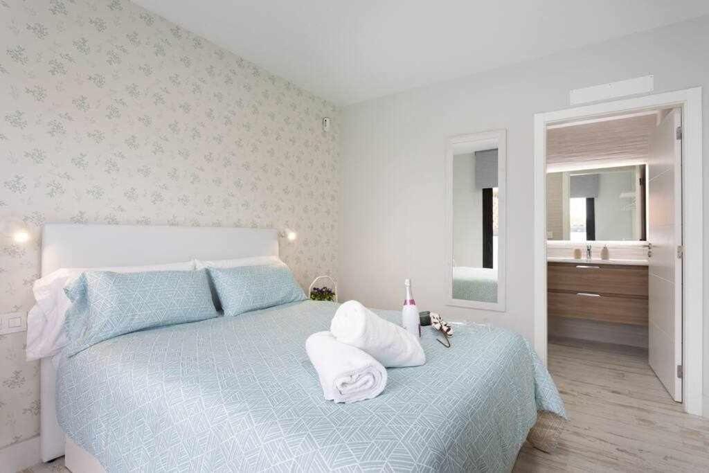 Postel nebo postele na pokoji v ubytování Sunnyland Villa Sueño Azul